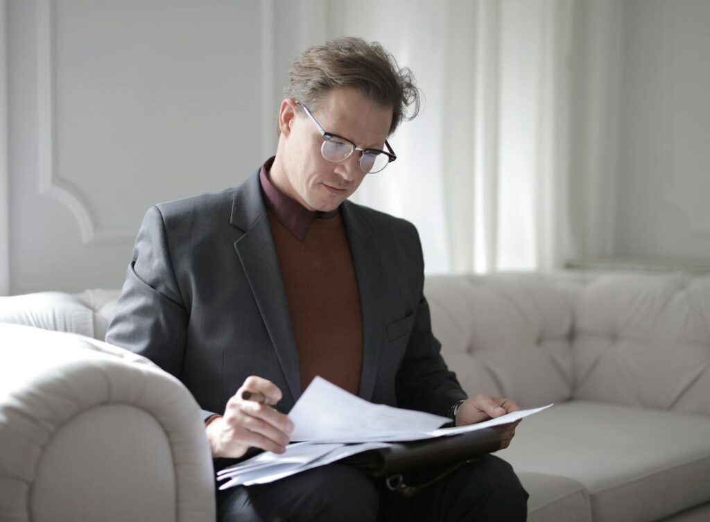 Man looking through documents