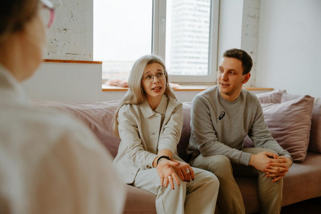 Couple talking with therapist during divorce