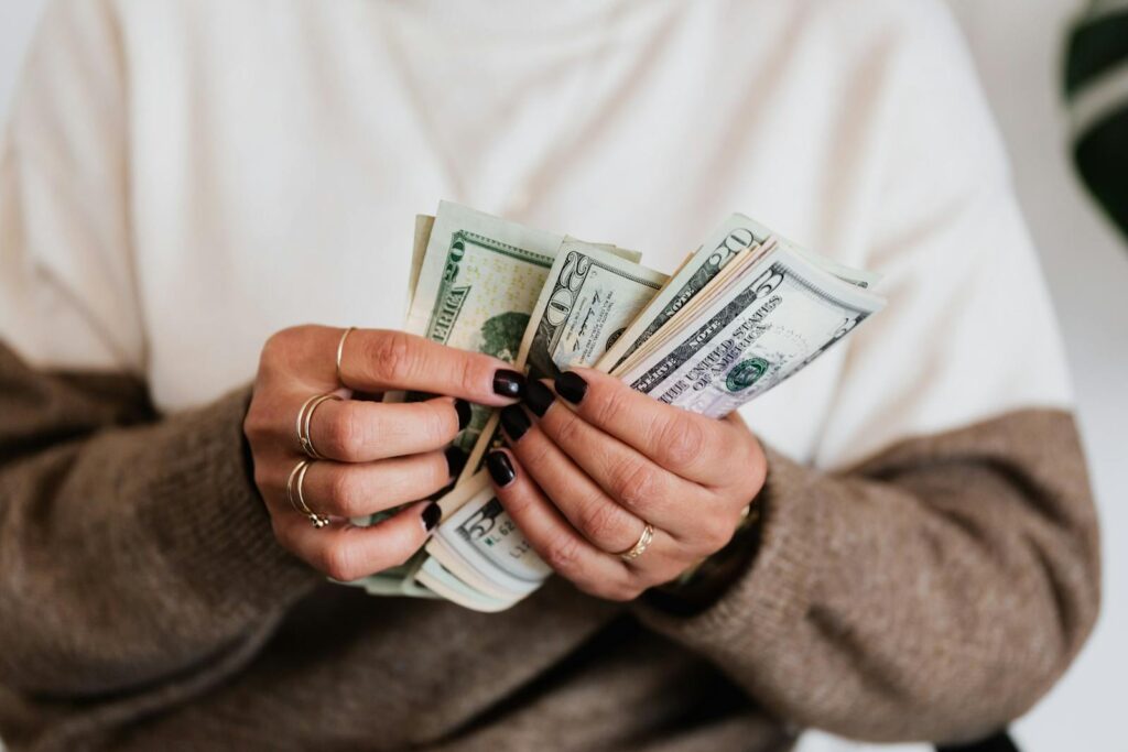 Woman preparing money for divorce