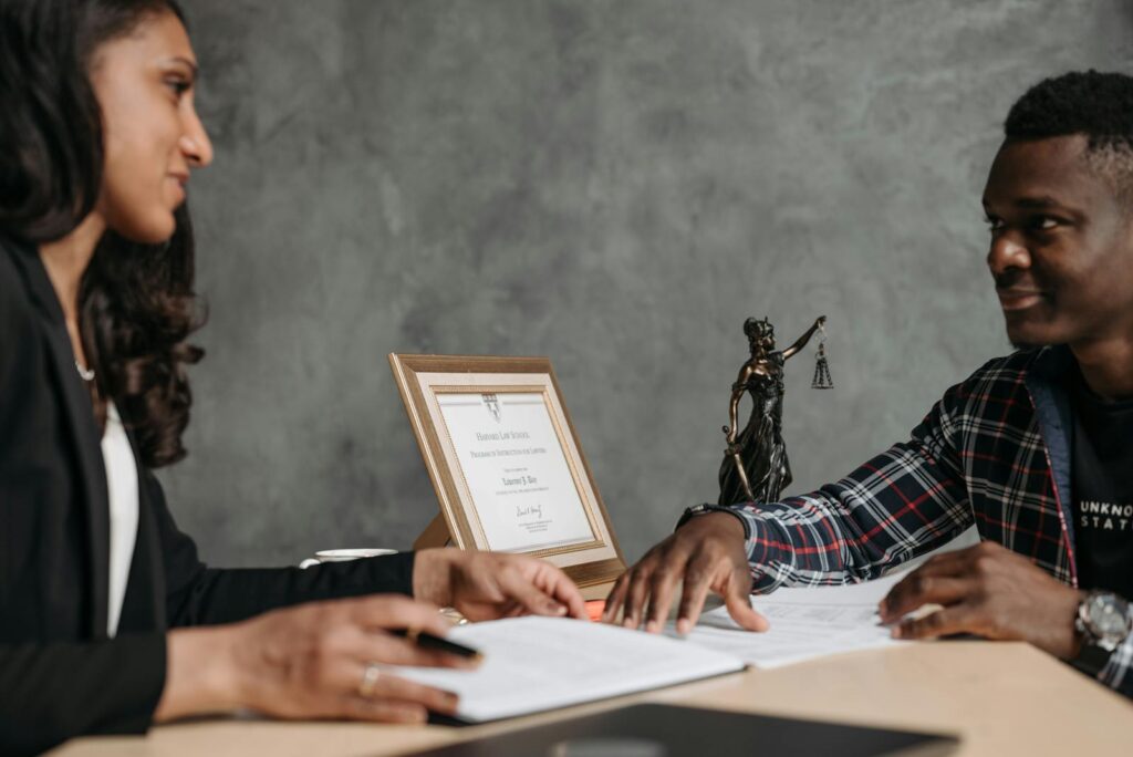 Woman signing divorce agreement