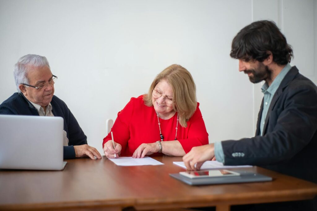 Woman Signing a Trust in an Office