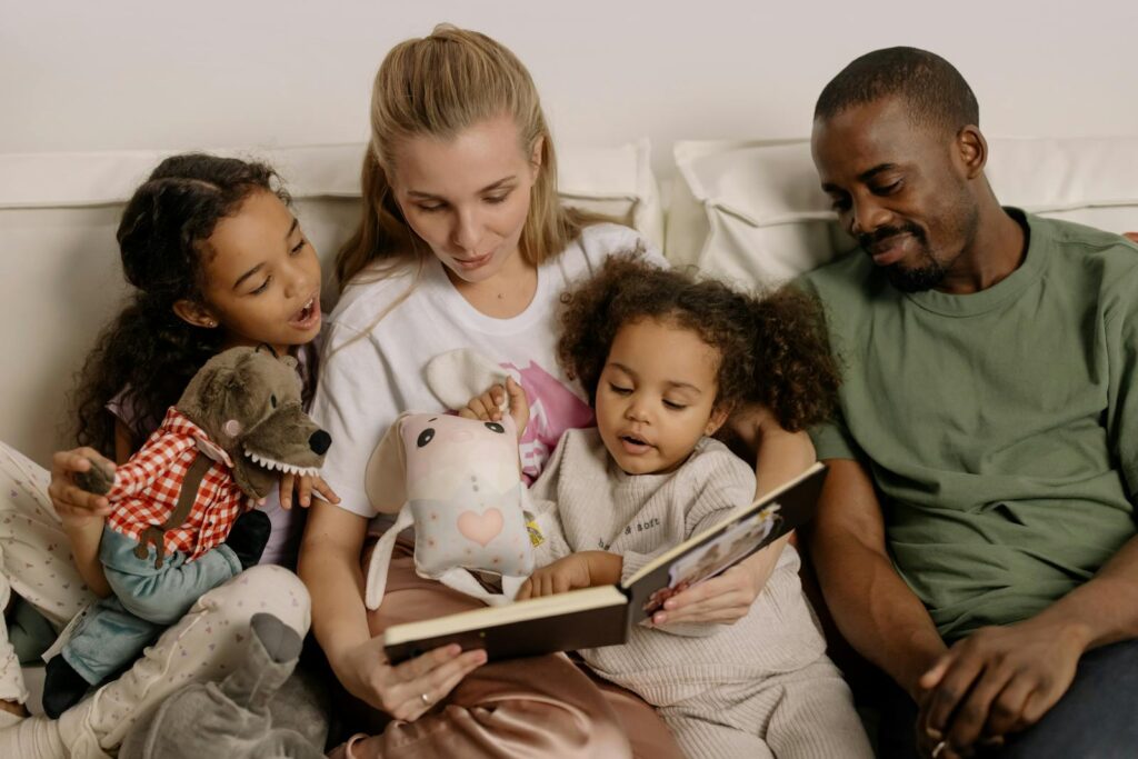 Parents read a book to their children during separation