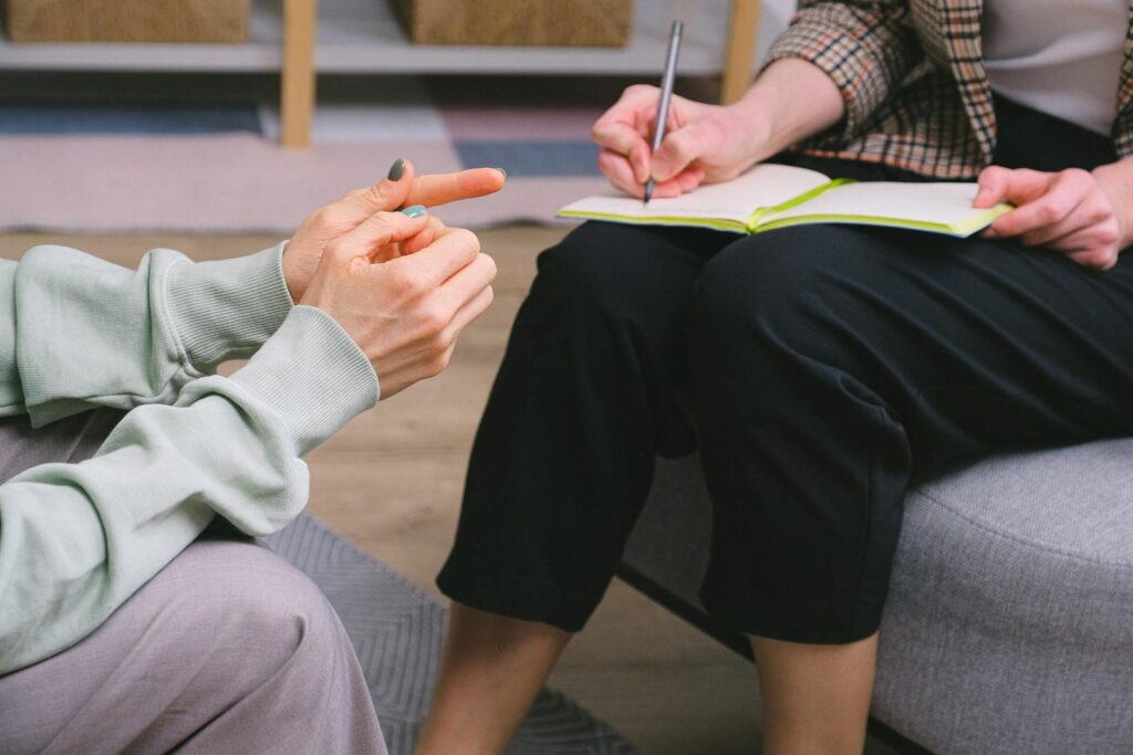 Person having session with psychologist