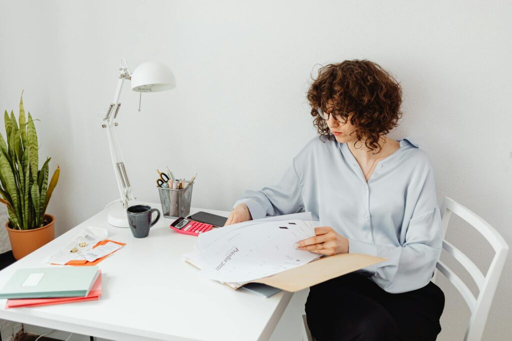 Woman looking at divorce papers