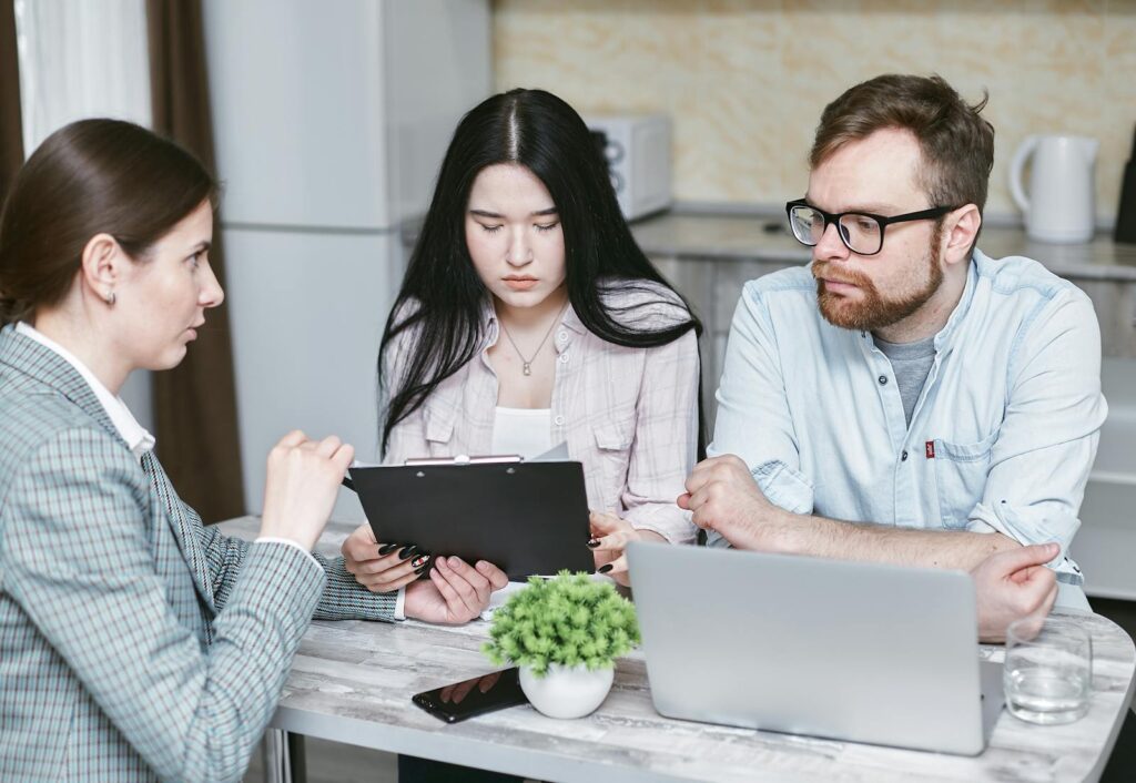 Couple having a meeting with lawyer