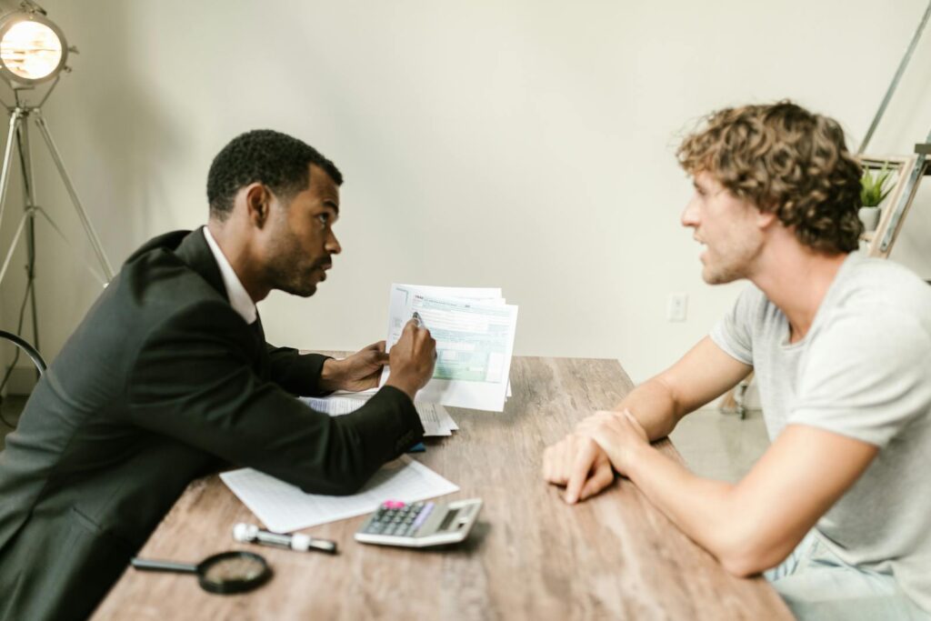 Creditor showing documents to his client