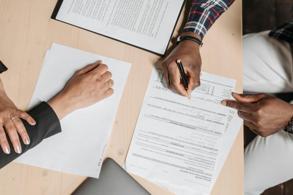 Man signing legal documents