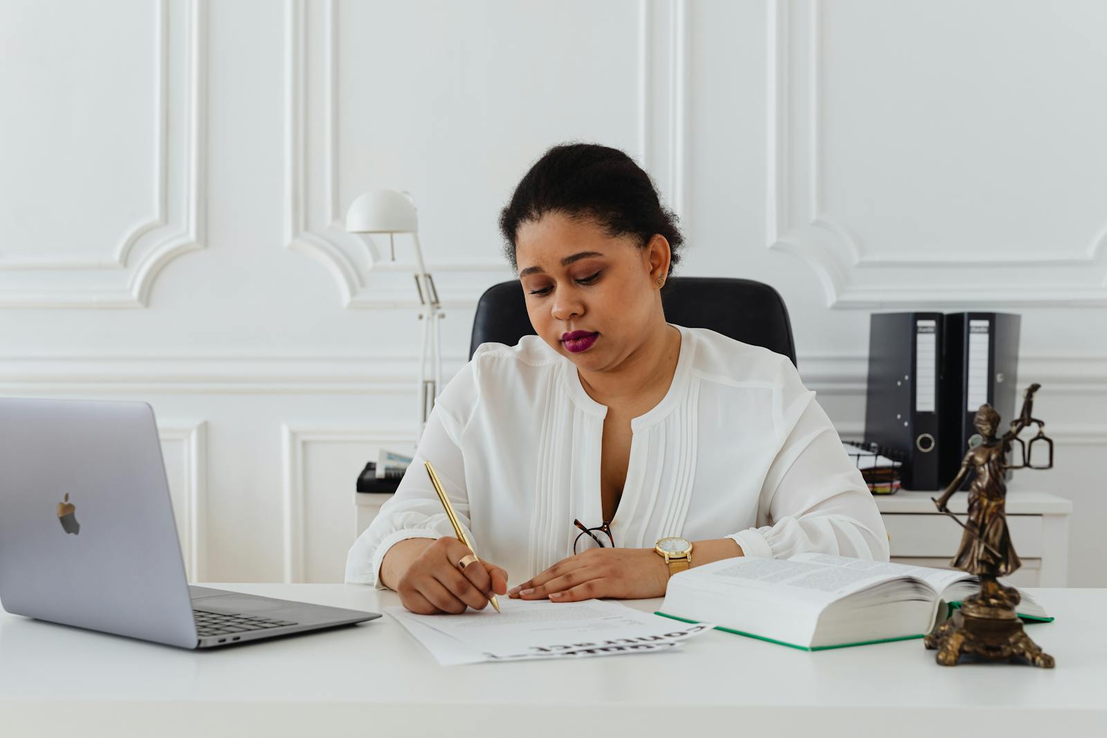 Lawyer creating a living trust at her office